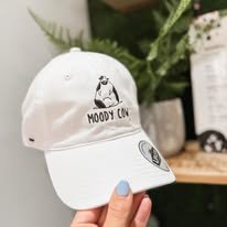 Moody Cow caps